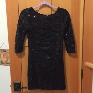 Sparkly black body con dress